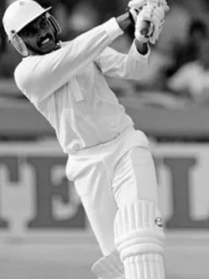 A black and white photo capturing the intensity of a Test match. Real cricket tests your character over five days.