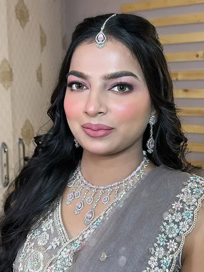 The final portrait of our HD engagement client. Her skin is glowing, and the makeup enhances her features beautifully without looking heavy.