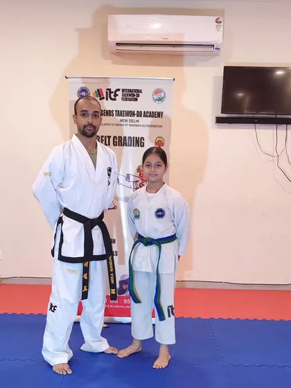 This young girl has earned her new belt through dedication and practice. I'm excited to see her continue to grow in the art.
