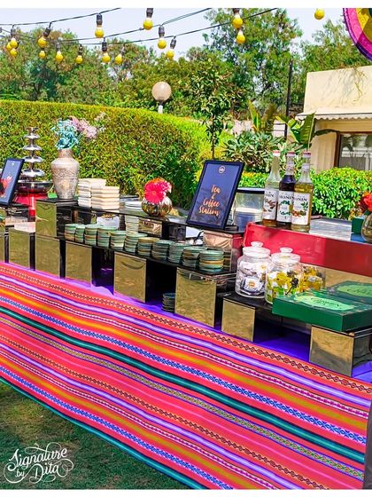 The coffee station was styled with a vibrant striped runner, reflecting the colorful palette of the Mexican fiesta.