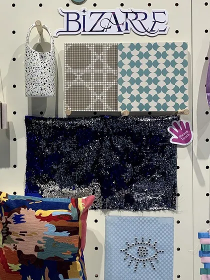 A material board for the 'Artify' trend, showcasing our process of translating the metaverse into a physical and tactile language. The board combines digital prints, sequined fabrics, and geometric patterns to explore the theme of consuming art in the digital age.