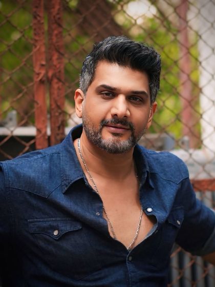 This shot captures the confident attitude that comes with a great haircut. The styling is clean, professional, and perfectly suited for an actor's headshot.