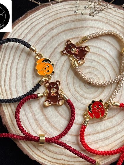 Cute teddy bear and cartoon character rakhis for the youngest members of the family. These adjustable braided bands are soft, safe, and adorable.