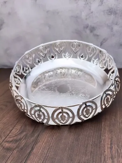 A German silver tray with a leaf-themed latticework border, a beautiful and nature-inspired design.