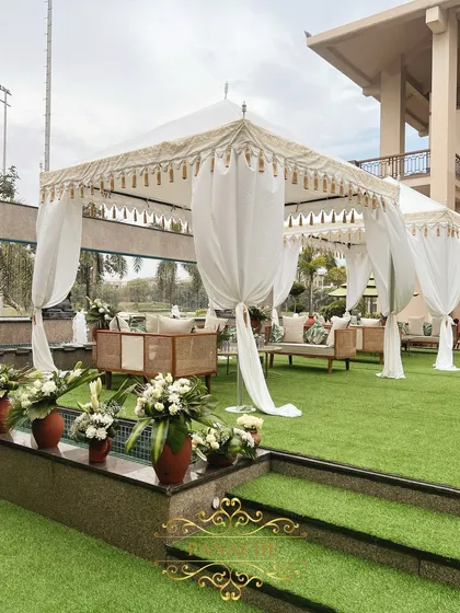 Another view of the stylish cabana lounges, perfect for a relaxed daytime event.
