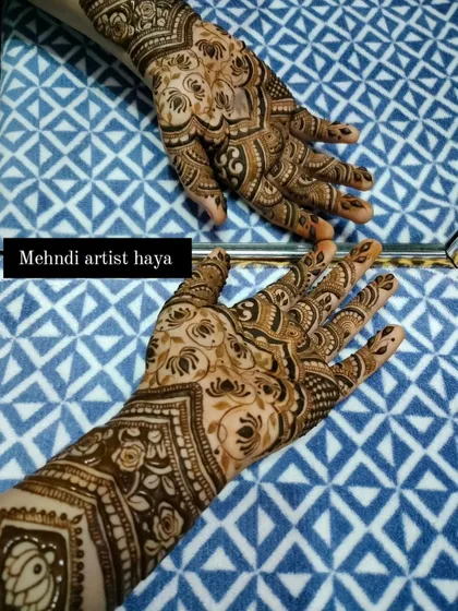 A beautiful shot of two hands with complementary bridal designs, showcasing how I can create a cohesive look for both hands.