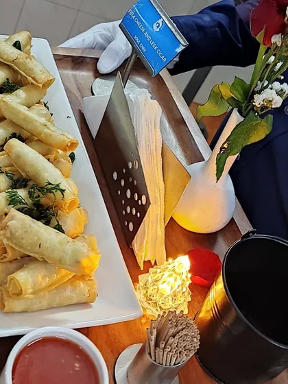 We were honored to cater for the Indian Coast Guard's New Year's Eve bash. This image shows our Feta Cheese & Leek Cigars, a popular appetizer at the event.