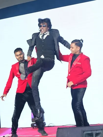 A dramatic lift during a dance sequence. These 'wow' moments are a staple of my high-impact corporate performances.
