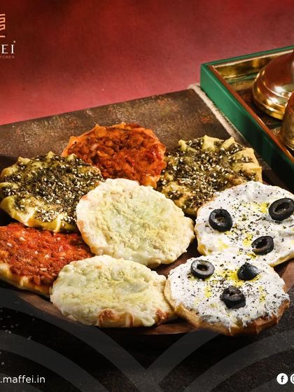 The Manakeesh Platter, offering a variety of our most popular toppings. It’s a perfect dish for sharing and sampling the different flavors we offer.