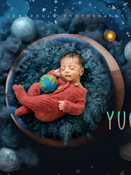 Holding the whole world in his hands. This composite image places baby Yug in a cosmic setting, symbolizing his arrival at the dawn of a new era.
