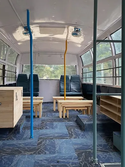 The interior of the completed "Wonder on Wheels" bus. We helped design and execute this mobile classroom, which brings education to the children of daily laborers in Bangalore, transforming a standard bus into a bright and functional learning space.
