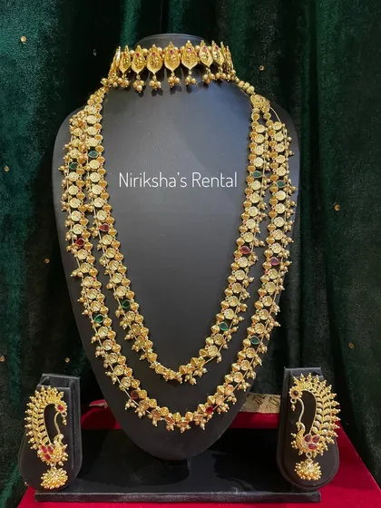 A three-layer necklace set with multi-colored stones, perfect for adding a touch of color to your outfit.