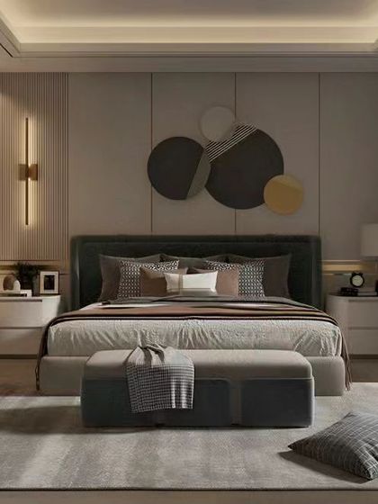 We created a calm and contemporary bedroom with a neutral color palette. The design features a large, comfortable bed with an upholstered headboard, abstract wall art, and a glass-paneled wardrobe that adds a sense of depth and sophistication.