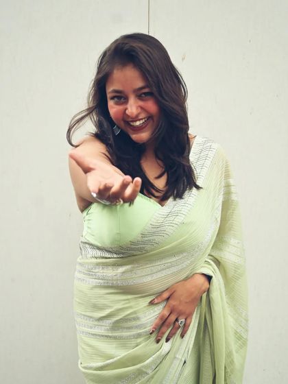 A playful and happy shot in my desi look. I love interacting with the camera and showing my personality through my photos.