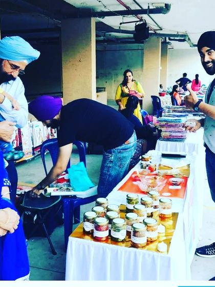 The whole family involved from the very beginning. Here's my son and husband helping out at an early stall.