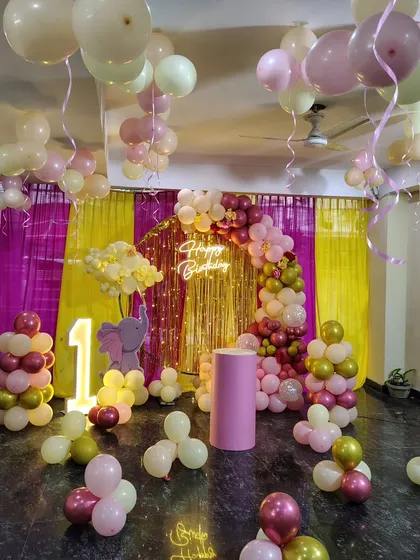 The full room view of the elephant-themed first birthday celebration.