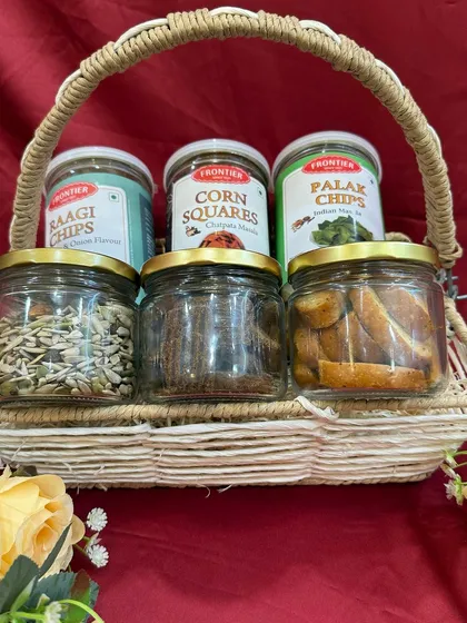 A look inside one of our wedding hampers, featuring a mix of healthy baked snacks and other treats.