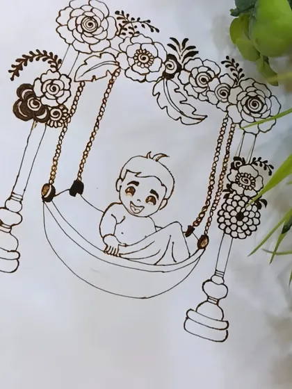A sweet baby shower design featuring a baby in a decorated swing (paalna). This is a perfect way to celebrate the mother-to-be.