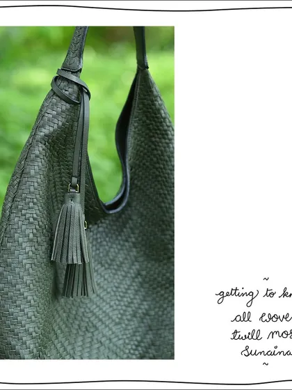 A detail shot of the All Woven Twill Moss Sunaina, highlighting the signature tassels and the intricate hand-weaving.