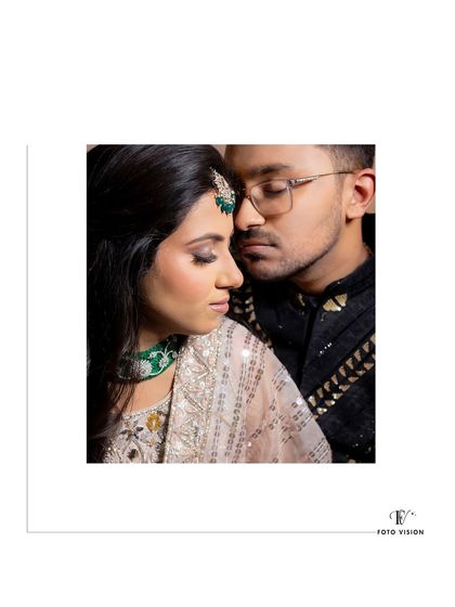 A close-up, artistic portrait of the couple, their faces close together, creating an intimate and romantic mood.