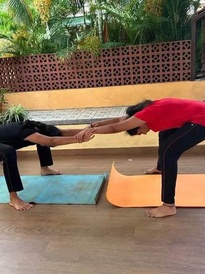 This partner stretch is excellent for opening up the chest and shoulders. By working together, students can find a greater range of motion than they might on their own, all while building trust.