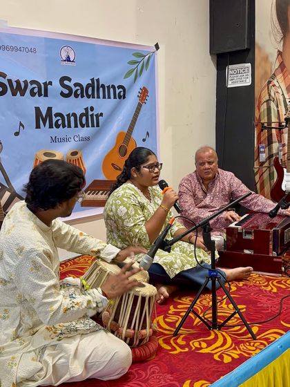 An adult student performs a classical piece, showcasing the depth of training we offer. It's never too late to connect with your musical roots, and we provide the guidance for that journey.