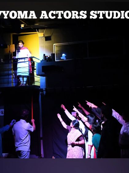 A dramatic scene from a student play, using the unique architecture of our space to create a powerful stage picture.