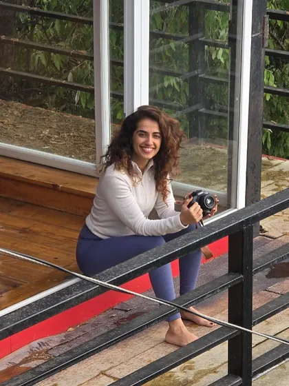 A candid moment behind the camera during the Sthiram 2.0 retreat. I love capturing the small, in-between moments that tell the story of our time together.