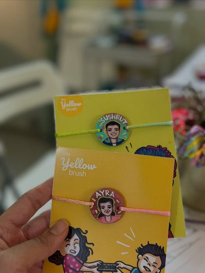Our studio has been buzzing with love, packing these personalized Rakhis with custom names and portraits.