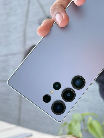 A close-up, detailed shot of the Samsung Galaxy S25 Ultra's camera array. This macro product shot is designed to highlight the technology and craftsmanship of the device.