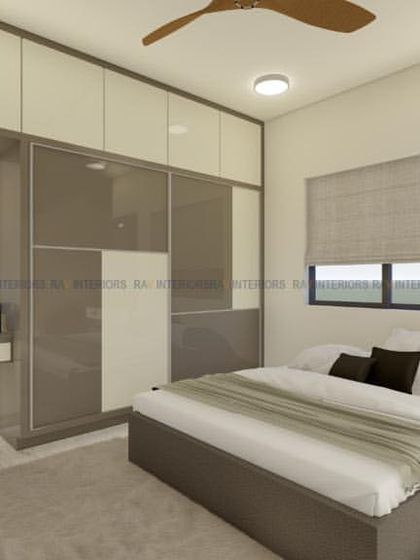 A compact and functional bedroom design with a study desk, a vanity mirror, and a wardrobe with a grey and white finish.