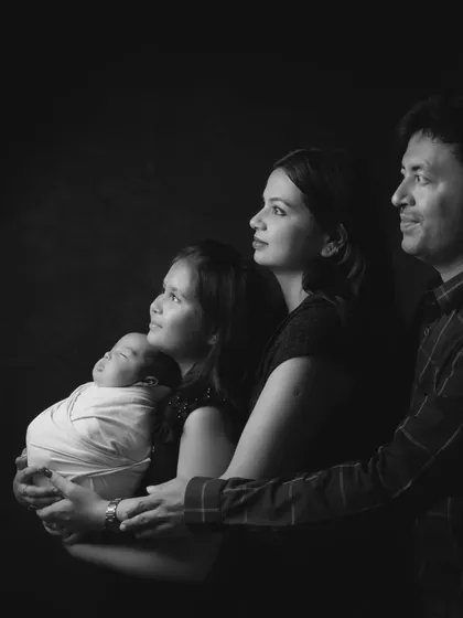 A classic black and white portrait that shows the beautiful continuity of family. This shot brings together three generations, creating a powerful and elegant family heirloom that will be cherished forever.