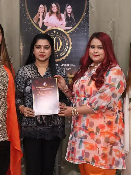 A happy graduate holding her certificate. These ceremonies are a celebration of the hard work and dedication my students put in throughout their courses.