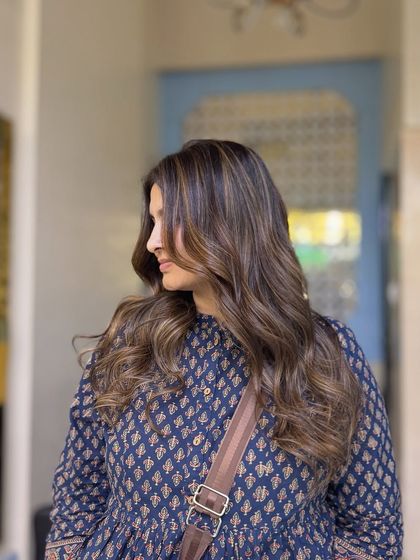 Rocking blonde hair is all about confidence. This stunning balayage is perfect for making a statement, with beautiful highlights that catch the light with every move.