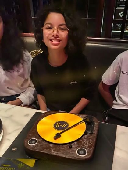 A custom turntable cake for a birthday celebration with Farhan Akhtar's family. The edible record player design was a fun and unique theme to work on.