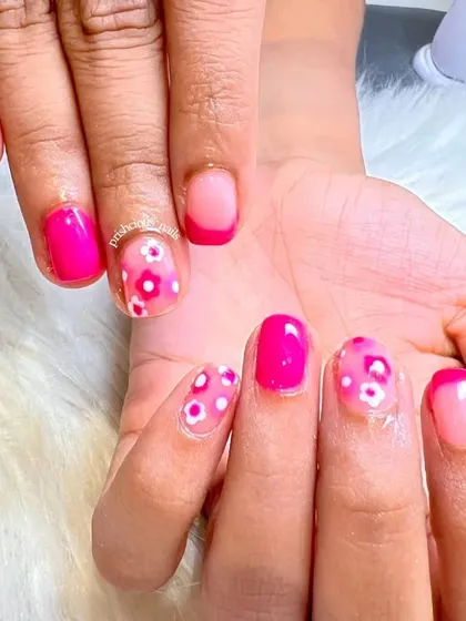 A super cute and girly set with hand-painted flowers. I used a blooming gel technique to create the soft, watercolor-like petals on a bright pink base.