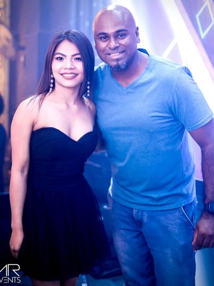 Posing with a guest.