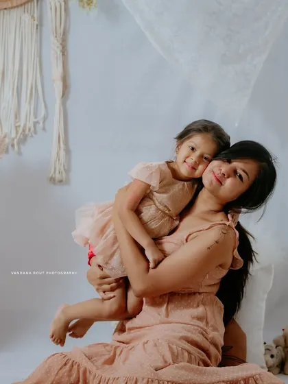 There's a special bond between a mother and her child, and I aim to capture that warmth in my Mom & Me sessions. This studio portrait uses a soft, bohemian-inspired theme with neutral tones to create a gentle and loving atmosphere.
