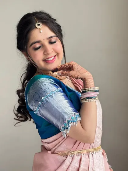 A close-up of Payal's happy expression, the ultimate goal of my work.