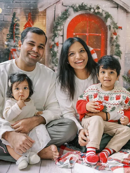 I love when families make holiday photos a yearly tradition. This cozy family portrait captures the warmth and cheer of the season, creating a beautiful memory to look back on year after year.