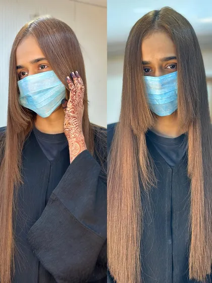 A sleek, straight haircut with face framing layers. This is a simple yet powerful way to update your look.