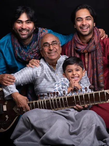 A family portrait celebrating Gurupoornima, a day to honour our teachers. My father's guidance has been invaluable, and I strive to pass on his wisdom and passion for music to all my students.