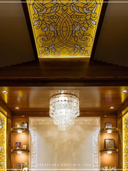 A magnificent pooja room with a backlit stained-glass ceiling and a grand crystal chandelier.