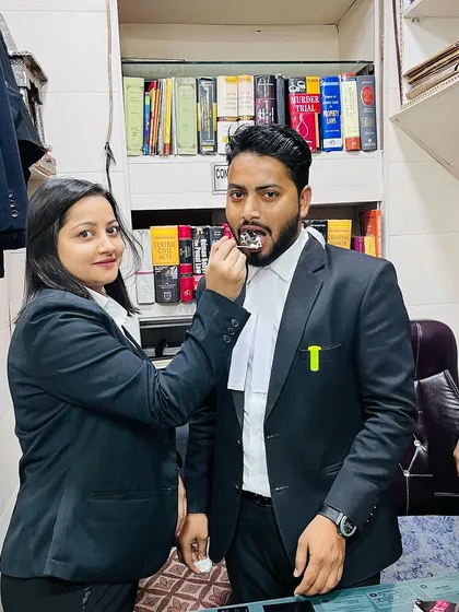 A colleague celebrating my band ceremony with me. The support of my team means everything.