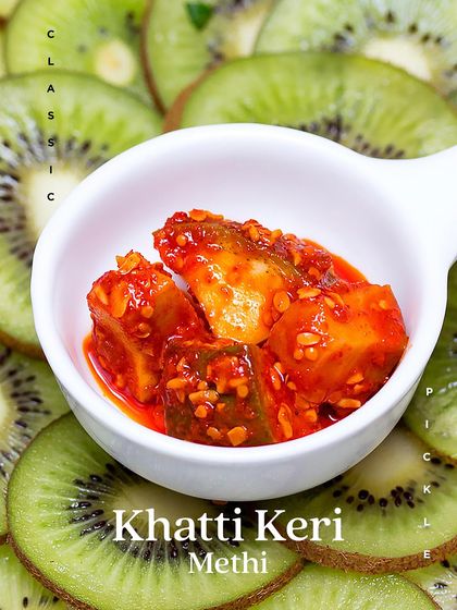 The final product: our Khatti Keri Methi pickle served in a bowl. The combination of sour mango and bitter fenugreek is a classic pairing loved across generations.