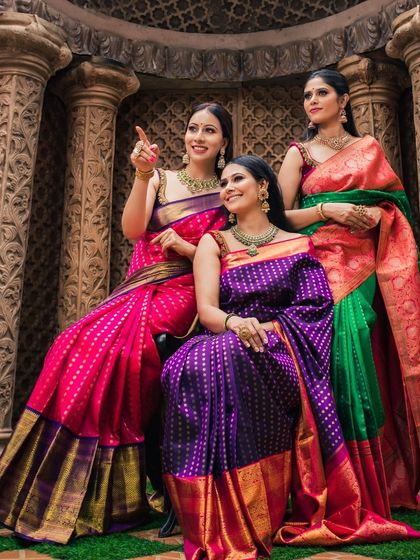 Three friends, three stunning sarees. This photo captures the joy and camaraderie of celebrating together in traditional attire.