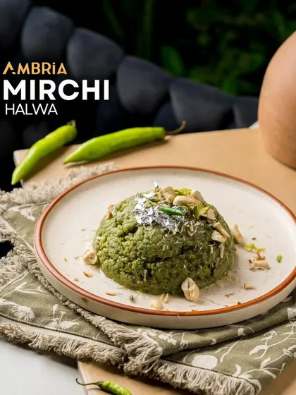 Are you ready for a sweet and spicy surprise? This is our Mirchi Halwa, a unique dessert that balances the richness of a traditional halwa with a subtle, warming hint of green chili. It’s a bold flavor statement.