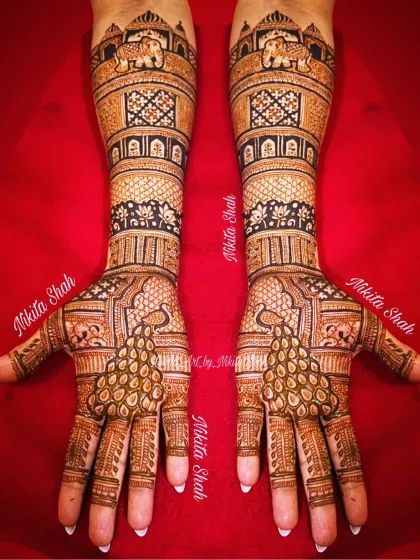 This is a full-coverage bridal mehendi for a client's relative, featuring majestic elephants and graceful peacocks. I specialize in creating these dense, traditional Indian designs that are perfect for the main family members at a wedding.