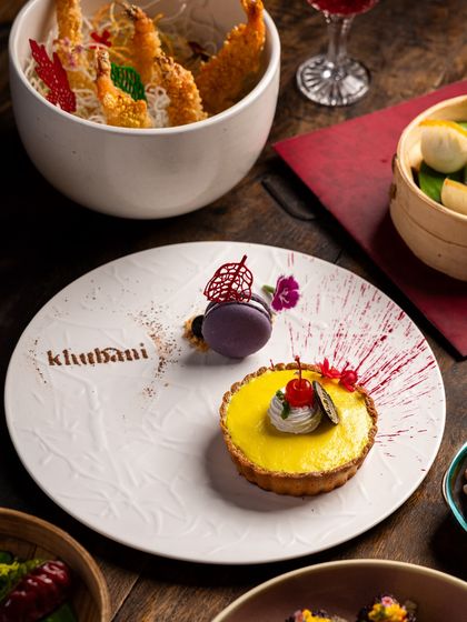 Dessert is the star of the show here. This stunning lemon tart, served with a delicate macaron, showcases the artistry and decadent flavors that make my desserts a pure indulgence.
