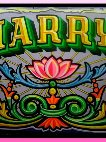 A nameplate for "Harry" from the American Embassy School, featuring a central lotus flower and ornate, colorful flourishes.